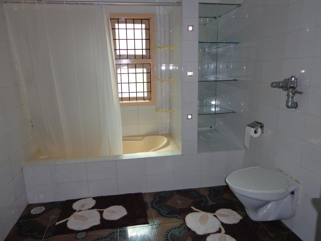 Remisha Service Apartments Madrás Habitación foto