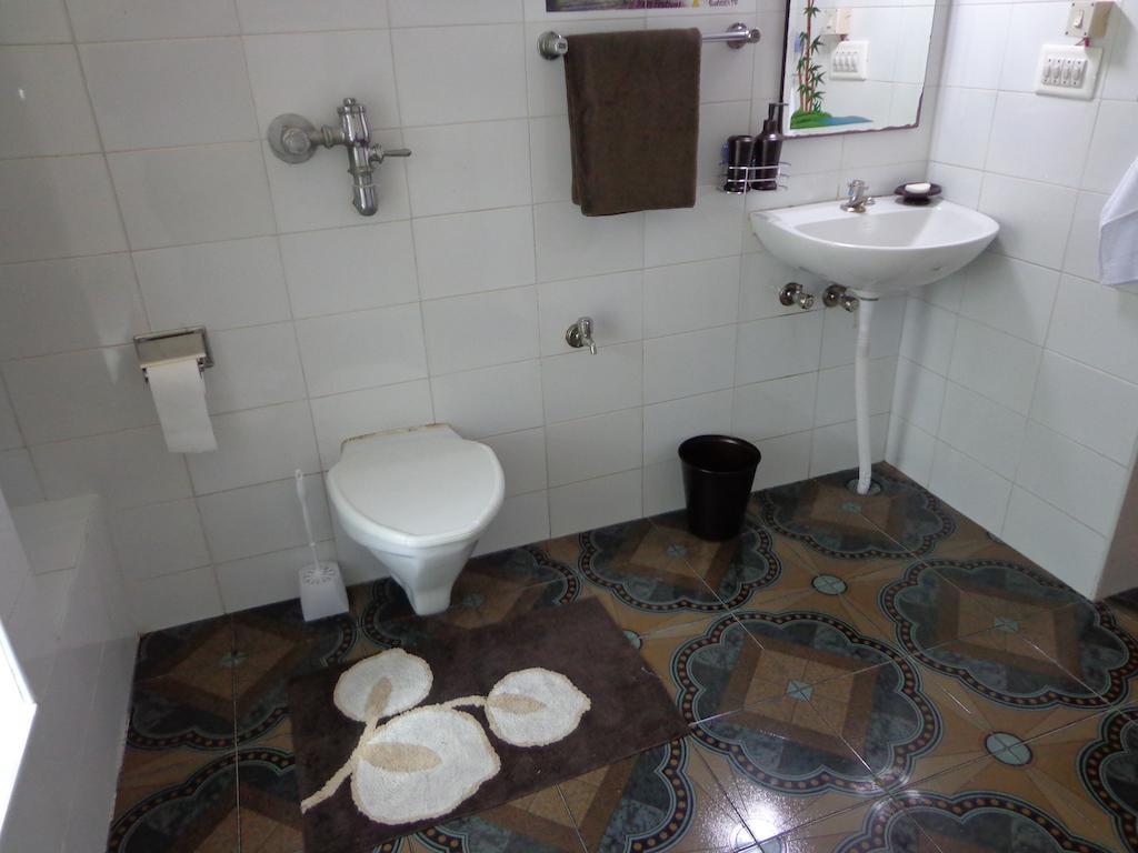 Remisha Service Apartments Madrás Habitación foto